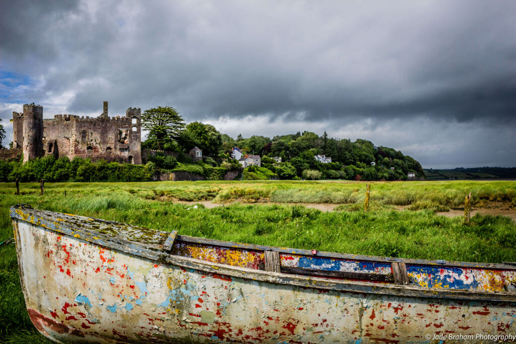 Laugharne Castle overlooking Carmarthen Bay.