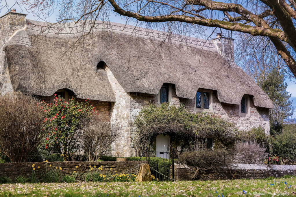 Thatched-roof cottage in Merthyr Mawr.