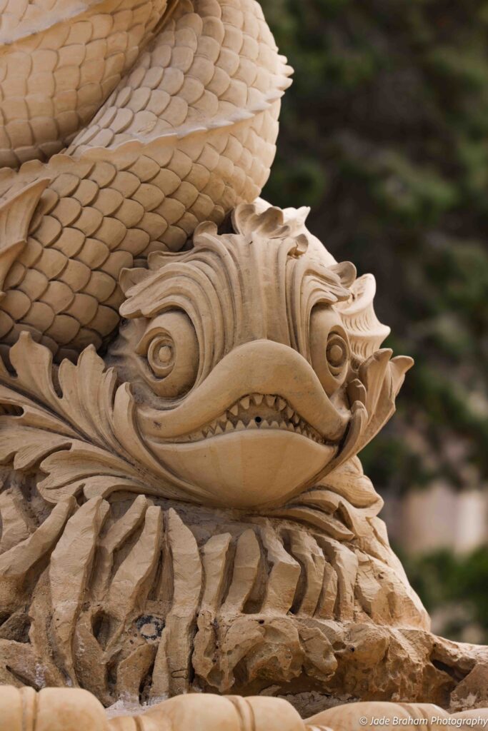 There is an intricate carving of a fish on one of the fountains in Valletta.