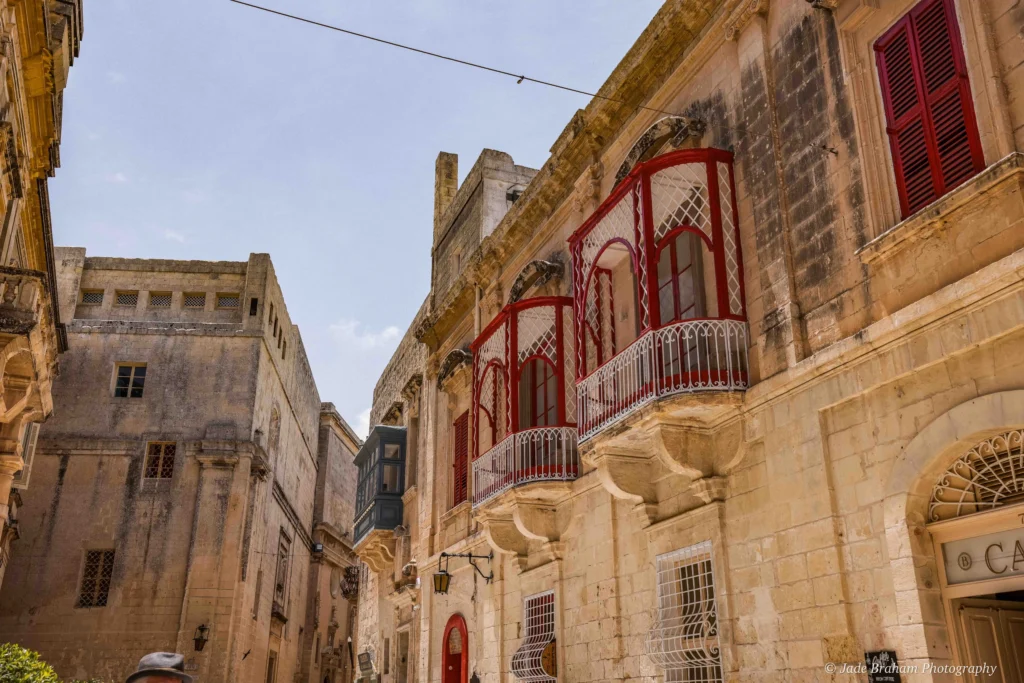 The streets in Mdina in Malta are littered with iron, colourful balconies.
