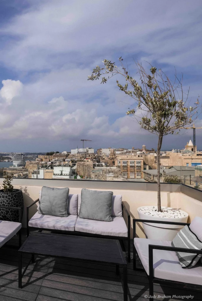 Palazzo Ignazio's rooftop bar has lots of comfortable sofas and ocean views. This is one of the best hotels in Malta.
