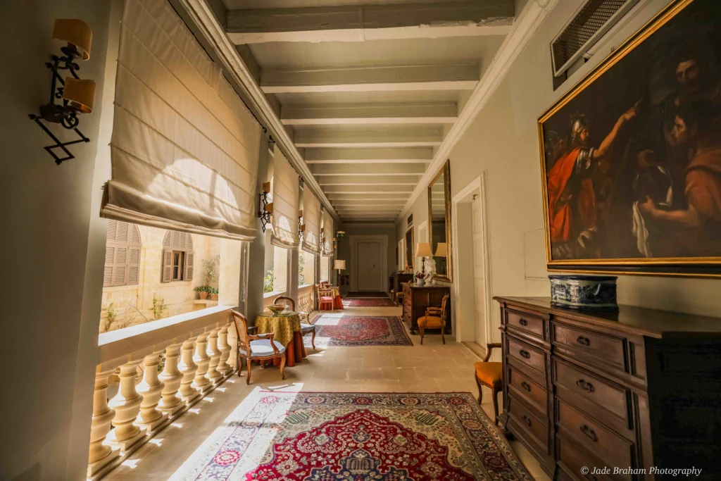 The Xara Palace has corridors filled with antiques and original artworks on the walls. 