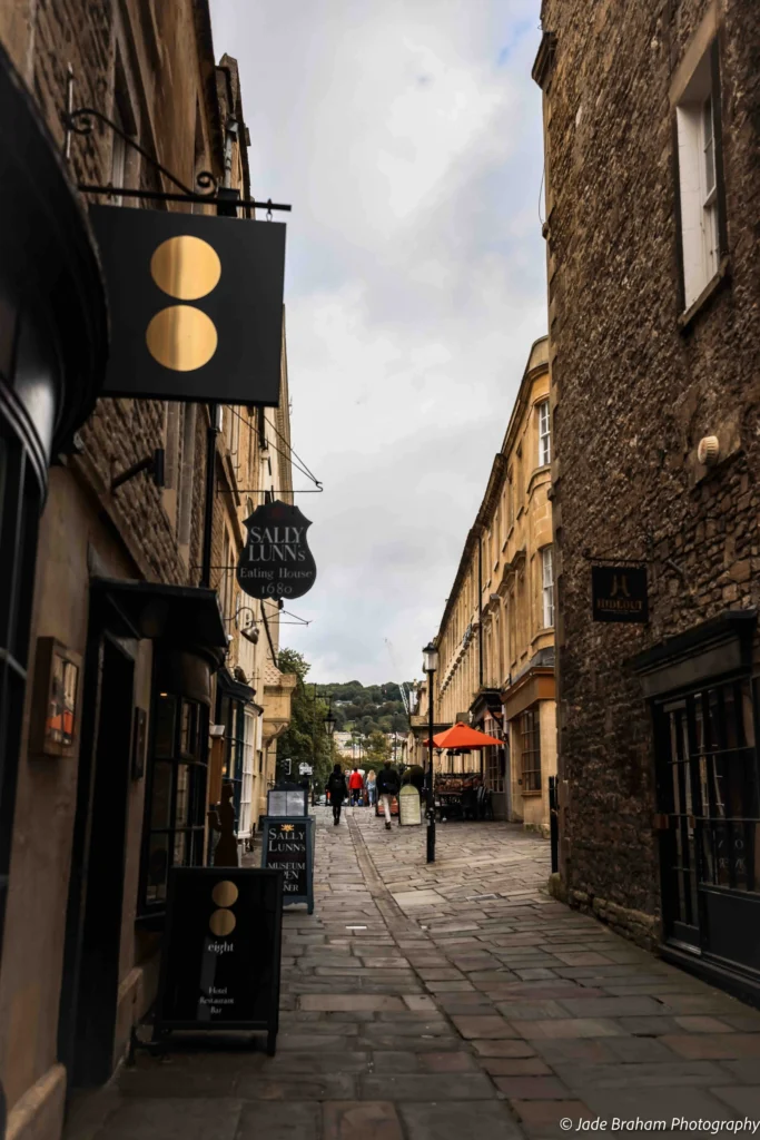 A cobblestone alleyway leading to Sally Lunn's Historic Eating House