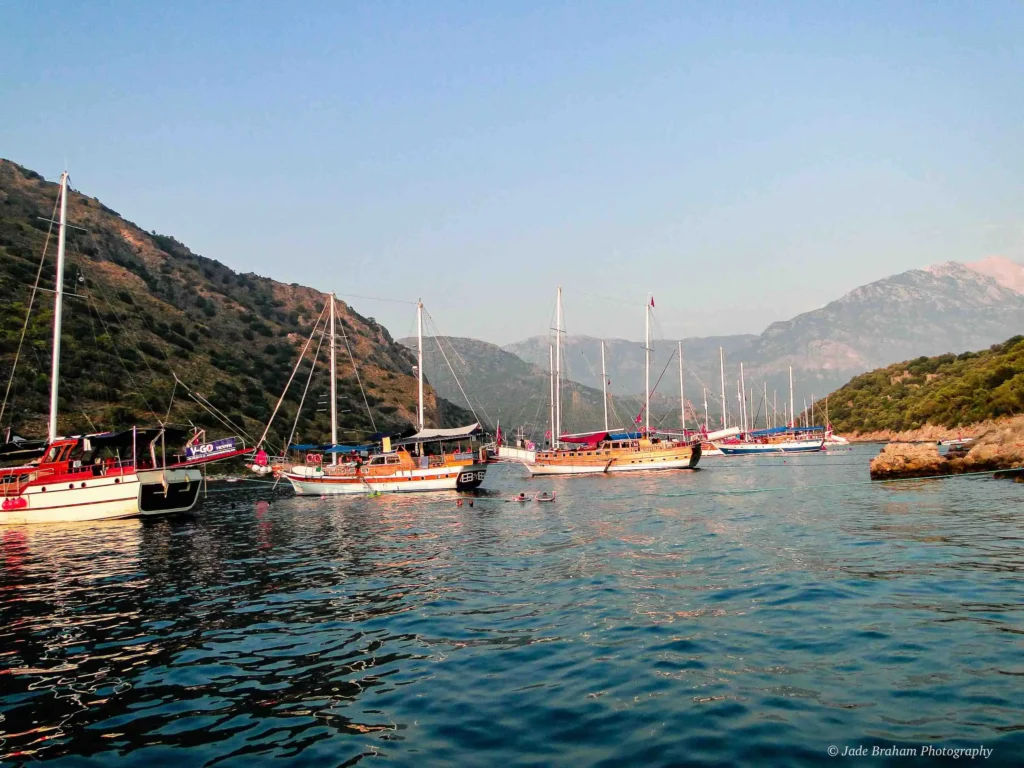 12 Island Boat Trip from Fethiye Harbour. Boats are docked at isloated islands. 